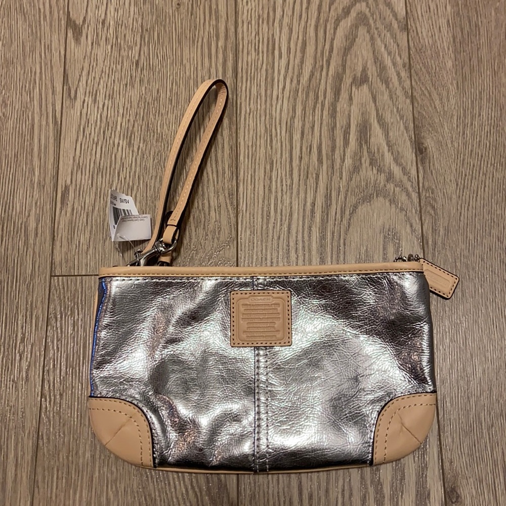 Brand new Coach wristlet